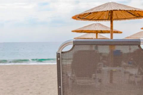 Sunbed close on beach background Stock Photos