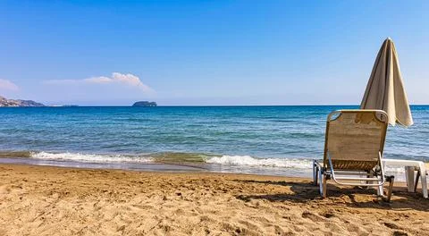 Sunbed on an epty beach Stock Photos