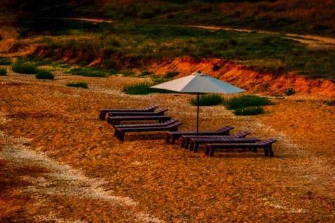 Sunbed With Parasol On The Beach. Stock Photos