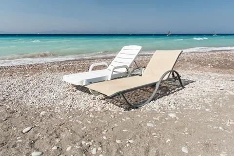 Sunbeds on the beach Stock Photos