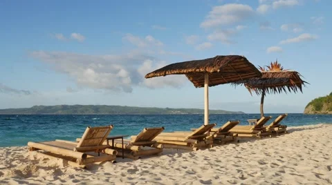 Sunbeds at the tropical beach Video stock 61473376