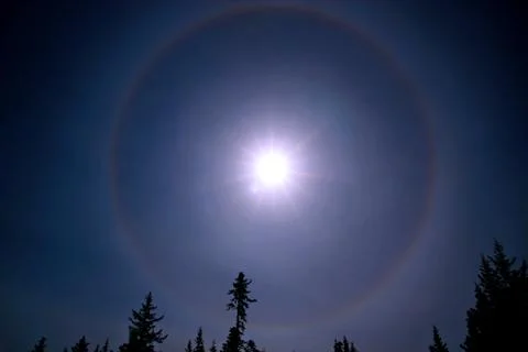 Sunbow with blue sky Stock Photos