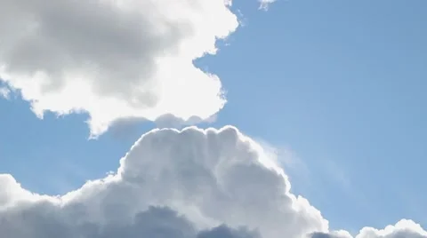 Sunburst emerging from clouds Stock Footage 8521095