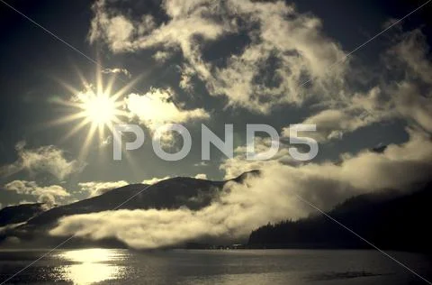 Sunburst with fog Stock Photos