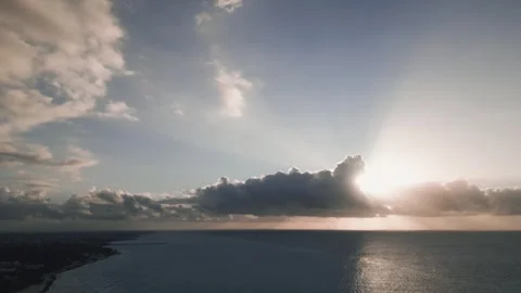 Sunburst glowing over the ocean horizon Stock Footage 345681845