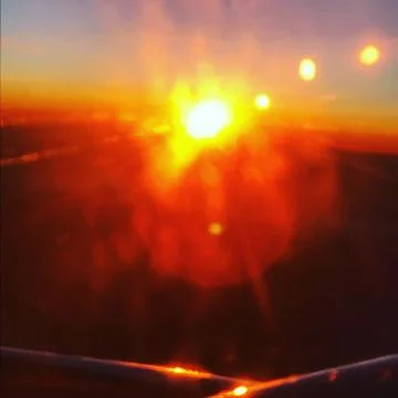 Sunburst Plane window Foto stock