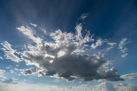 Sunburst sky with dramatic cloud formation and rays Stock Photos