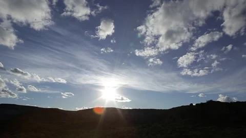 Sunburst Sunset over Serra da Capivara Silhouette Hills and Cirrus Clouds Stock Footage 321905337