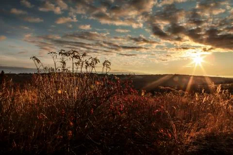 Sunburst at sunset Stock Photos