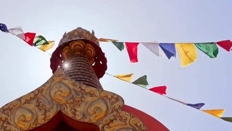 Sunburst Through Amitabha Stupa Crown and Prayer Flags Sedona Arizona Stock Footage 336383955
