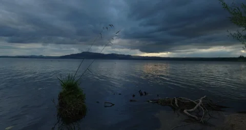 Sunburst Through Clouds: Wide-Shot of Nature's Radiance Stock Footage 250492525