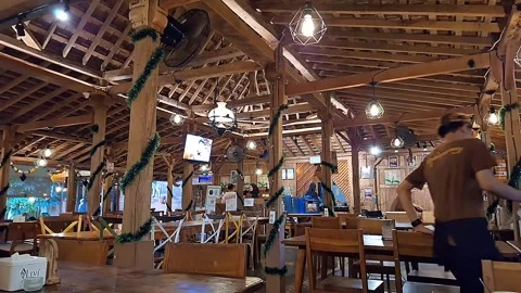Sundanese Dining Setting. Calm Restaurant Interior. Neat Table Arrangement Stock Footage 321134779