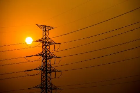 Sundawn with electric post Stock Photos