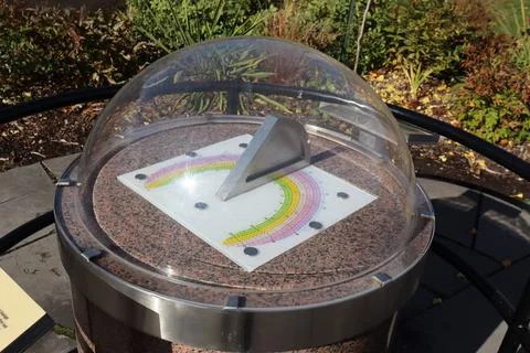 A sundial in a park Stock Photos