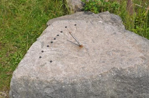 Sundial on a stone Stock Photos