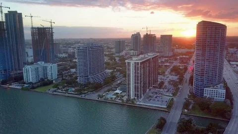 Sundown Behind a Miami Skyline from Biscayne Bay Florida Stock-Footage 79447599