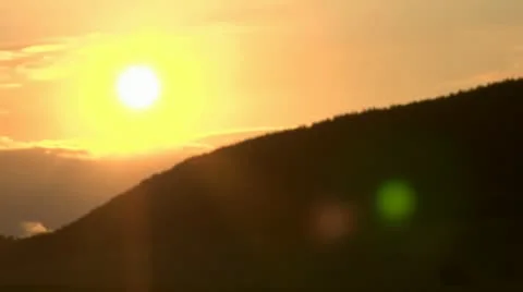 Sundown in front of a hill Stock Footage 11431251