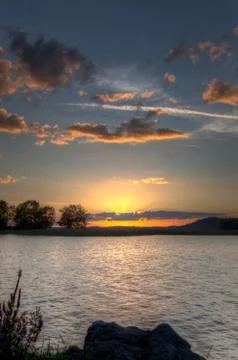 Sundown on horizon Stock Photos