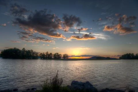 Sundown on horizon Stock Photos