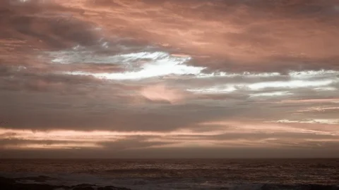 Sundown With Moody Cloudy Vanilla Sky And Large Flock Of Birds Over Sea 1080P25 Stock Footage 104269279
