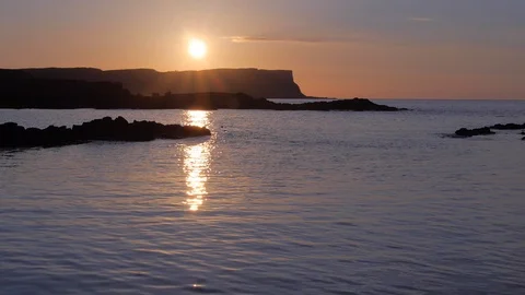 Sundown over Headland Time Lapse Causeway Coast Northern Ireland Stock Footage 99042247