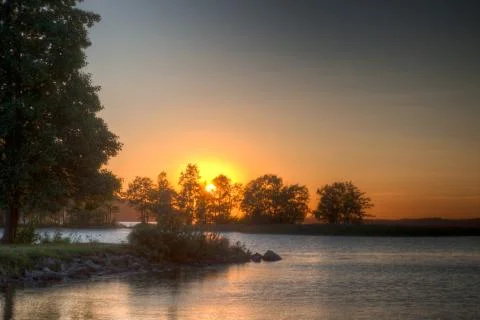 Sundown over an lake Stock Photos
