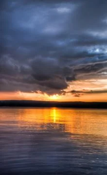 Sundown over an lake Stock Photos