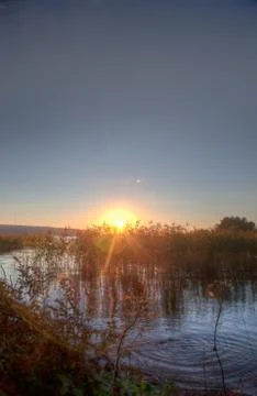 Sundown over an lake Stock Photos
