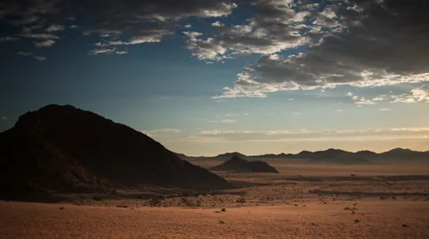 SUNDOWN OVER MOUNTAINS AND PLAIN HD Stock Footage 45342652