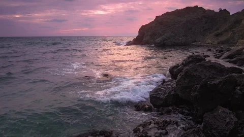 Sundown on the sea shore. Video stock 125655833
