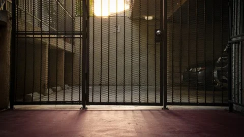 Sundown timelapse behind gate door Stock Footage 211540215