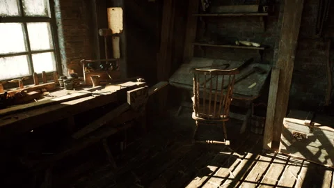 Sundrenched attic space featuring vintage writing tools and cozy ambiance Stock Footage 327611748