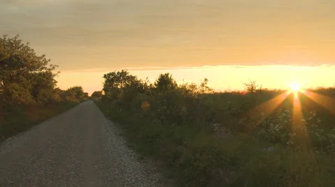 Sunet over field with road Vídeo Stock 3798246