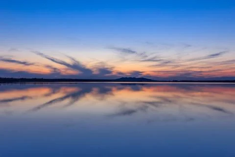 Sunet over lake Stock Photos
