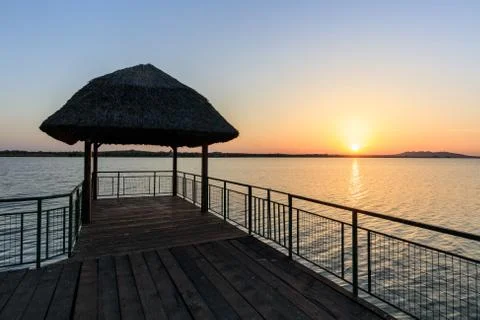 Sunet over lake Stock Photos