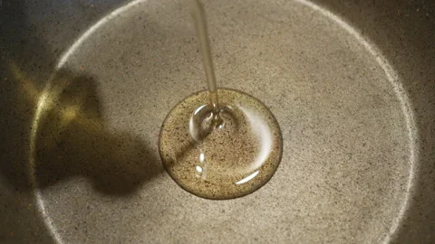 Sunflower oil heating Stock Footage 85745663