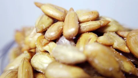 Sunflower seeds in closeup, looping 360 macro video Stock Footage 129804891