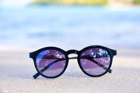 Sunglass is on beach Stock Photos