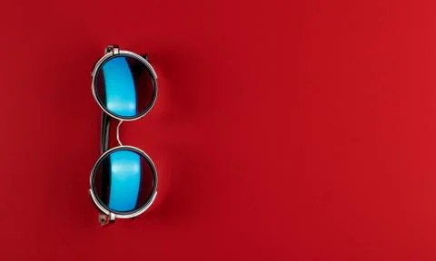 Sunglass on the red background with copy space. Stock Photos