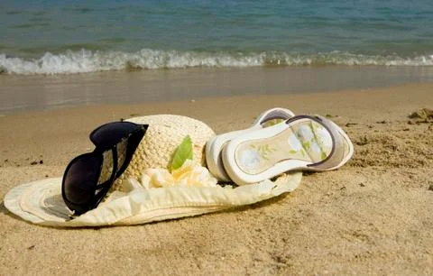Sunglasses and Straw hat Foto stock