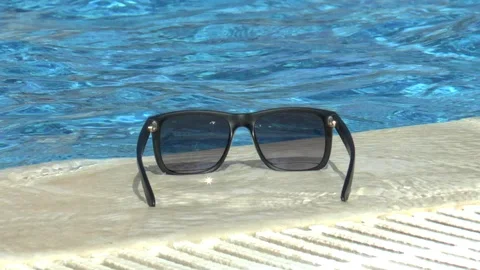 Sunglasses And Swimming Pool Stock Footage 95249774
