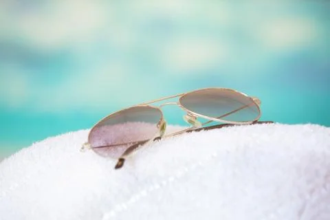 Sunglasses at the beach Stock Photos
