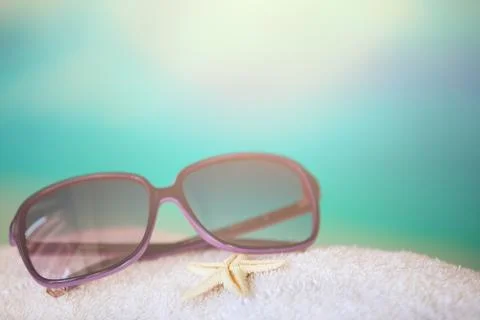 Sunglasses at the beach Stock Photos