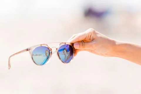 Sunglasses on the beach Stock Photos