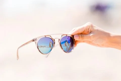 Sunglasses on the beach Stock Photos