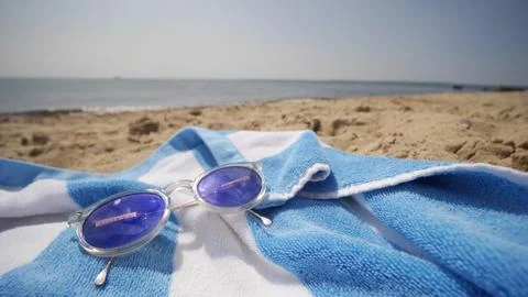 Sunglasses on Beach Stock Photos