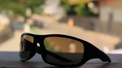 Sunglasses on the city background Video stock 49050108