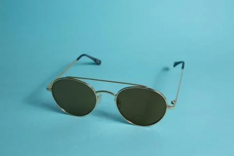 Sunglasses on color background Stock Photos