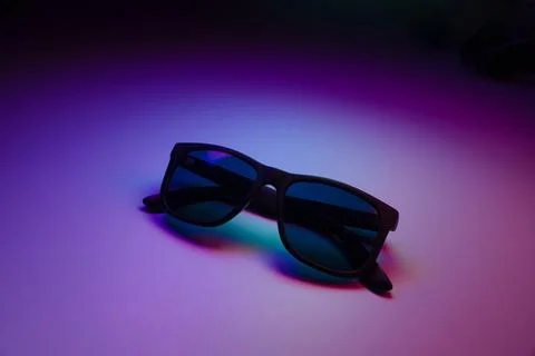 Sunglasses on a dark background Stock Photos