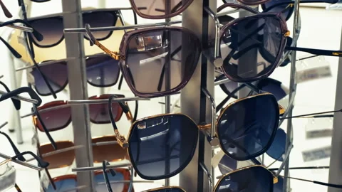 Sunglasses Display Stand in Optical Store | Designer Eyewear Collection Stock Footage 327175614